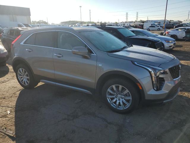 1GYFZCR48PF106043 - 2023 CADILLAC XT4 PREMIUM LUXURY TAN photo 4