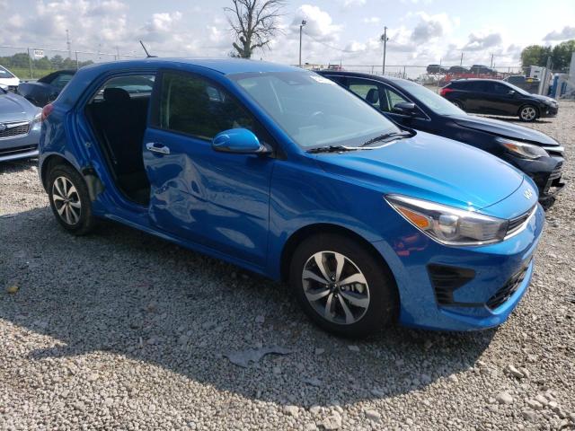 3KPA25AD4PE574678 - 2023 KIA RIO S BLUE photo 4