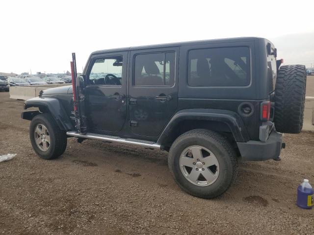 1J4HA5H11BL508712 - 2011 JEEP WRANGLER U SAHARA შავი ფოტო 2