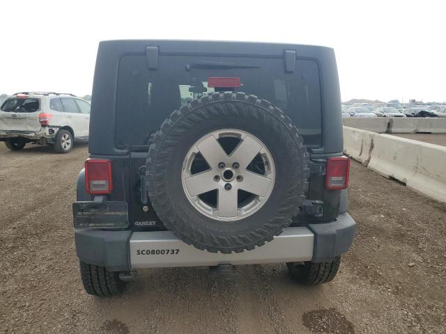 1J4HA5H11BL508712 - 2011 JEEP WRANGLER U SAHARA შავი ფოტო 6
