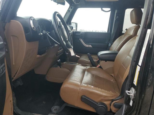 1J4HA5H11BL508712 - 2011 JEEP WRANGLER U SAHARA შავი ფოტო 7