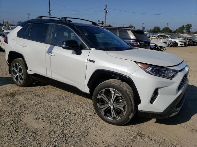 JTMEB3FV1PD116007 - 2023 TOYOTA RAV4 PRIME XSE WHITE photo 4