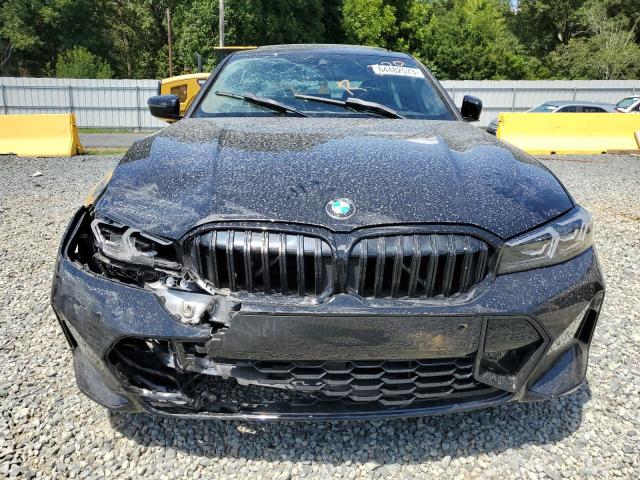 3MW69FF04P8C83820 - 2023 BMW 330I BLACK photo 5