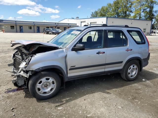 JHLRD78575C007718 - 2005 HONDA CR-V LX SILVER photo 1