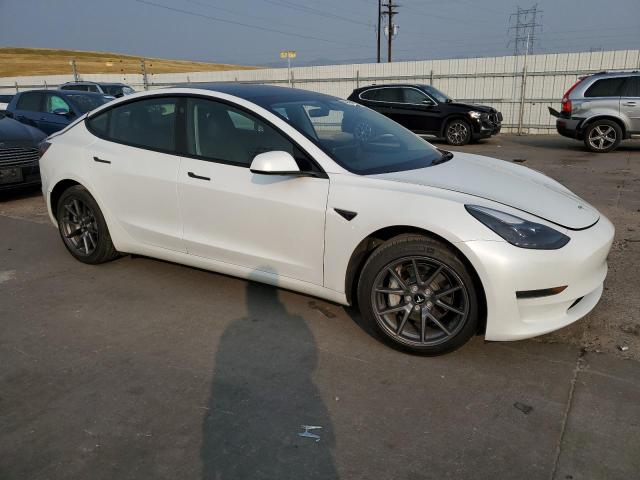 5YJ3E1EA8PF412488 - 2023 TESLA MODEL 3 WHITE photo 4