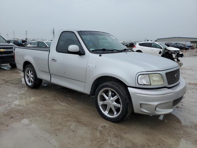 1FTRF172X2NA85034 - 2002 FORD F150 SILVER photo 4