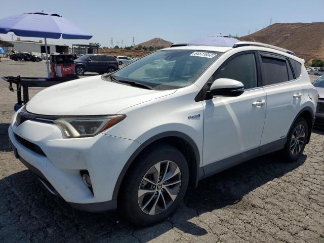 JTMRJREV4GD048486 - 2016 TOYOTA RAV4 HV XLE WHITE photo 1