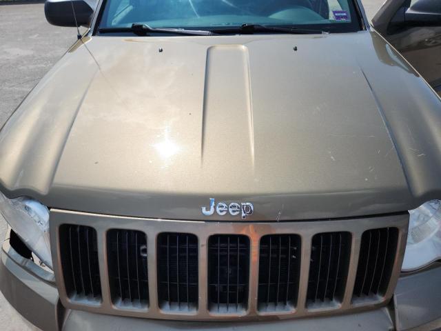 1J8GR48K59C548114 - 2009 JEEP GRAND CHER LAREDO 金色 照片 11