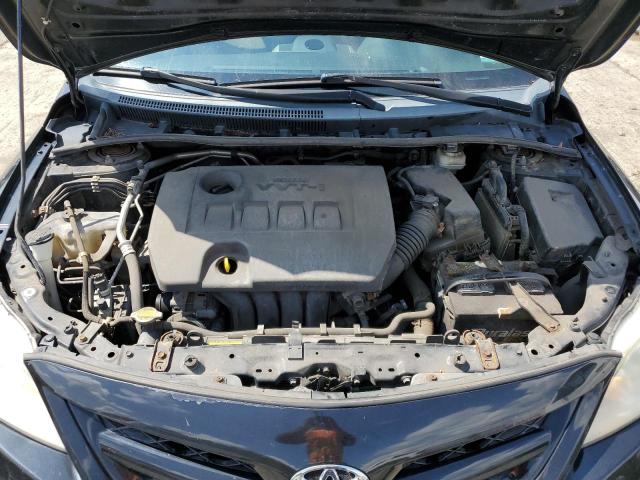 2T1BU4EE0CC855266 - 2012 TOYOTA COROLLA BASE Schwarz Foto 11