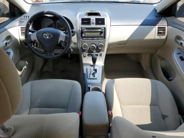 2T1BU4EE0CC855266 - 2012 TOYOTA COROLLA BASE Schwarz Foto 8