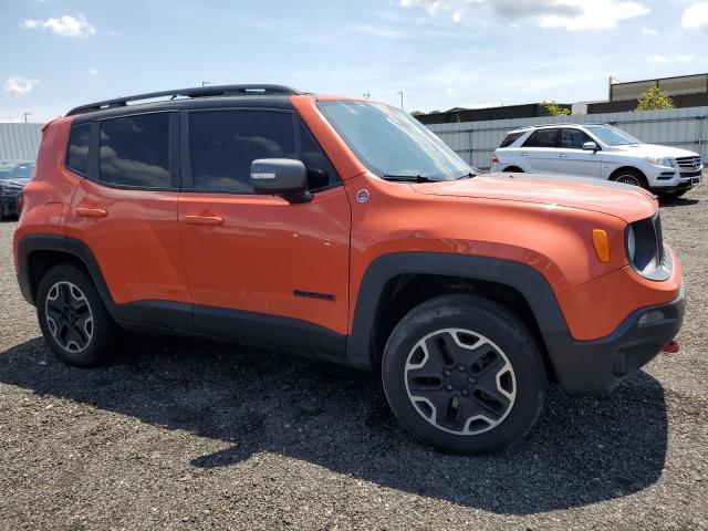 ZACCJBCBXHPE64289 - 2017 JEEP RENEGADE TRAILHAWK ORANGE photo 4