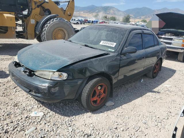 1Y1SK5282XZ423120 - 1999 CHEVROLET GEO PRIZM BASE GREEN photo 1