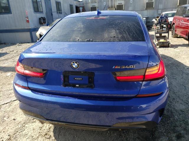 WBA5U7C06LFH16112 - 2020 BMW M340I Синий фото 6
