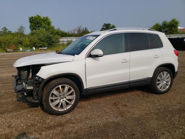 WVGAV3AX1EW607401 - 2014 VOLKSWAGEN TIGUAN S WHITE photo 1