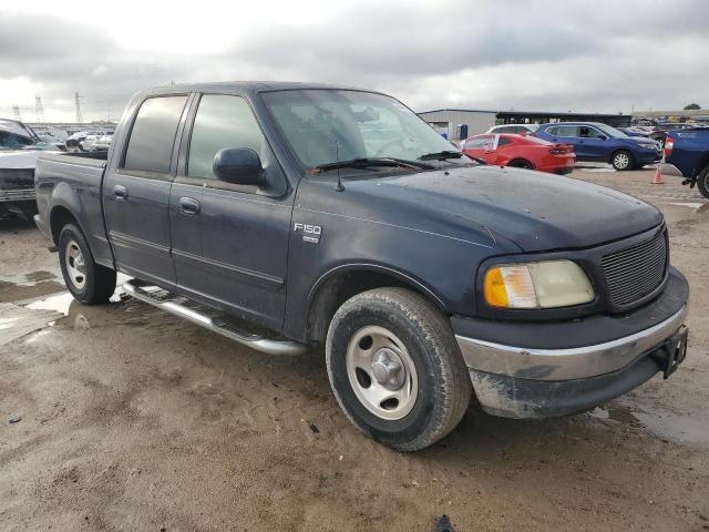 1FTRW07661KC12620 - 2001 FORD F150 SUPERCREW BLUE photo 4