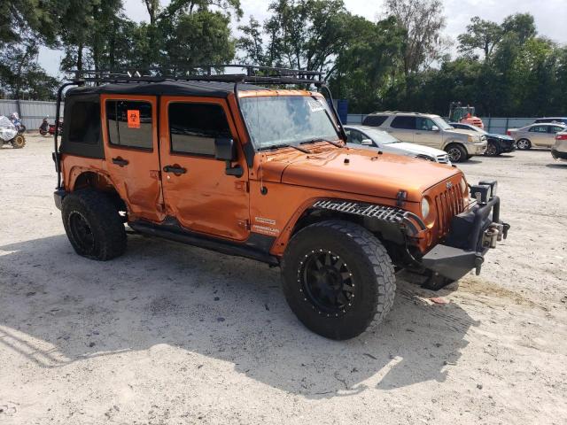 1J4BA3H15BL577395 - 2011 JEEP WRANGLER U SPORT ORANGE photo 4