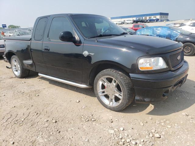 2FTRX07L4YCB09472 - 2000 FORD F150 BLACK photo 4