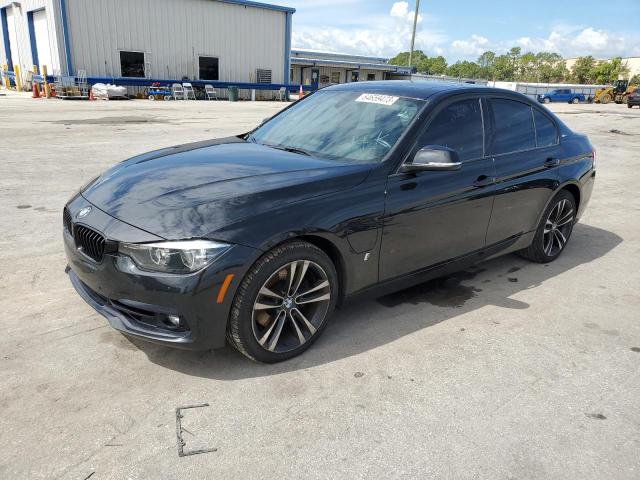 WBA8E1C59JA167581 - 2018 BMW 330E BLACK photo 1