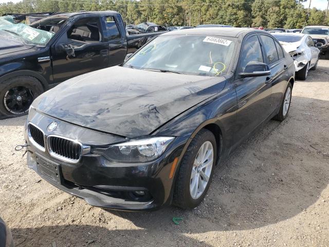 WBA8E5G58HNU41275 - 2017 BMW 320 XI BLACK photo 2