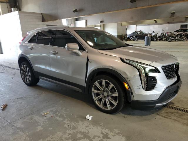 1GYFZDR41NF142434 - 2022 CADILLAC XT4 PREMIUM LUXURY SILVER photo 4