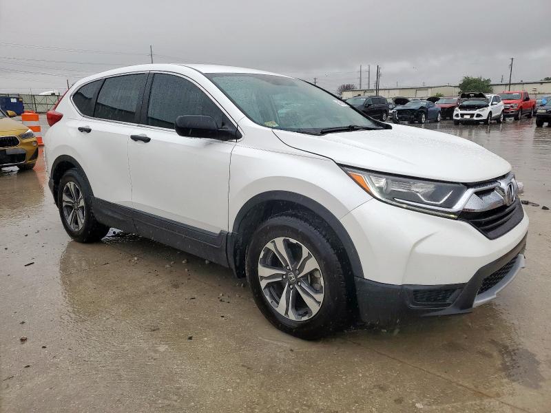 2HKRW5H31KH413696 - 2019 HONDA CR-V LX WHITE photo 4