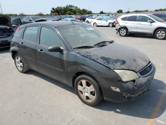 1FAHP37N67W161516 - 2007 FORD FOCUS ZX5 BLACK photo 4