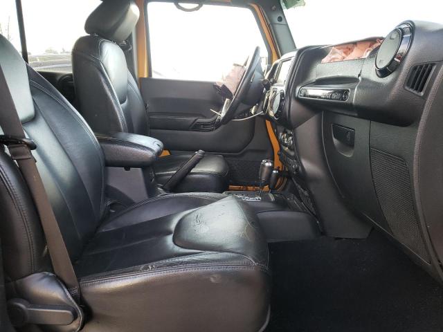 1C4HJWEG7EL282216 - 2014 JEEP WRANGLER U SAHARA ORANGE photo 5