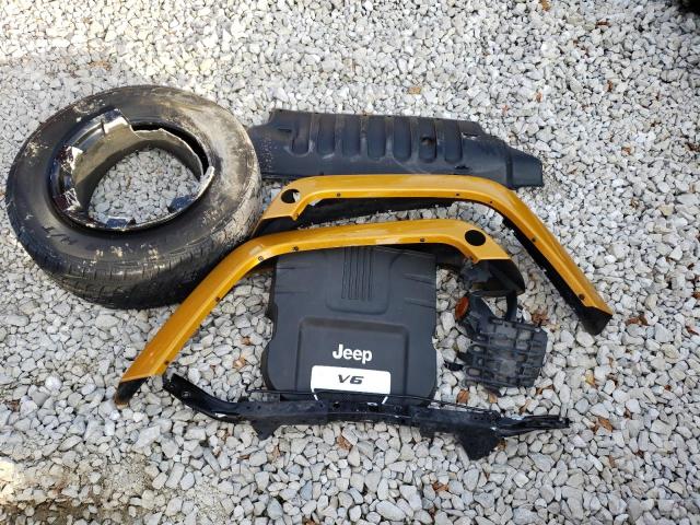 1C4HJWEG7EL282216 - 2014 JEEP WRANGLER U SAHARA ORANGE photo 9