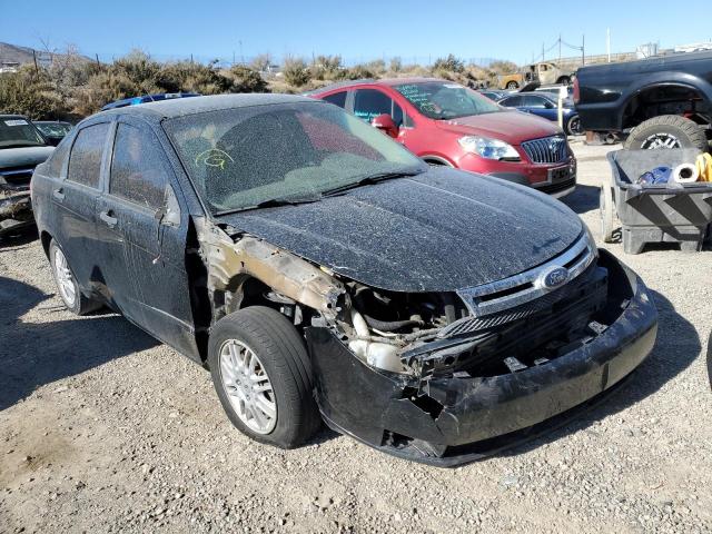 1FAHP3FN9BW112059 - 2011 FORD FOCUS SE BLACK photo 1