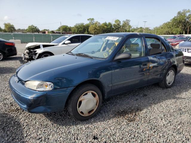 1Y1SK528XYZ421231 - 2000 CHEVROLET GEO PRIZM BASE BLUE photo 1