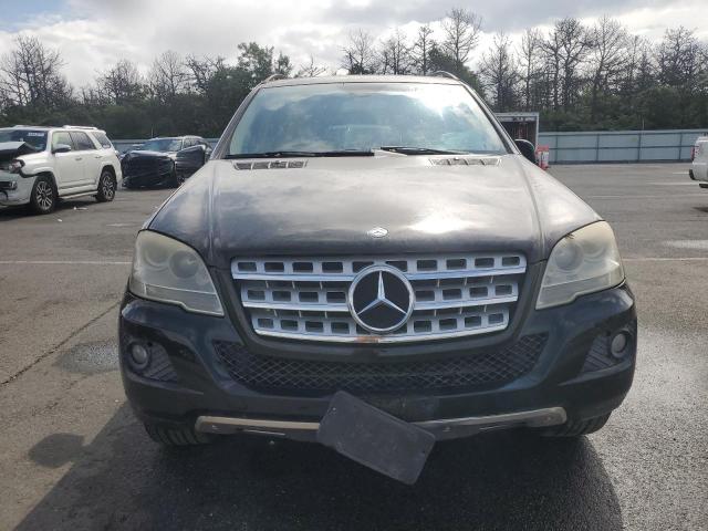 4JGBB8GB2BA670070 - 2011 MERCEDES-BENZ ML 350 4MATIC BLACK photo 5