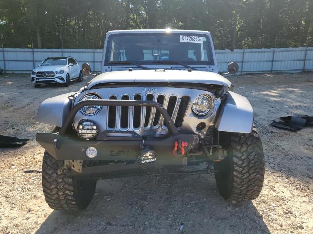 1C4BJWEG7GL107294 - 2016 JEEP WRANGLER U SAHARA SILVER photo 5