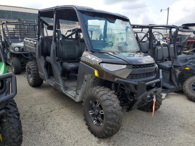 4XARSF991P8066792 - 2023 POLARIS RANGER CREW XP 1000 TEXAS EDITION BROWN photo 1