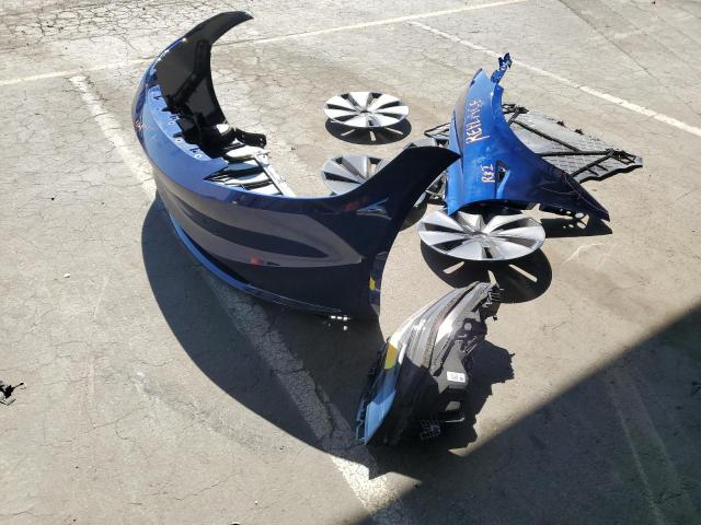 5YJ3E1EA3SF023945 - 2025 TESLA MODEL 3 ლურჯი ფოტო 12