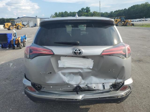 JTMBFREV1JJ238015 - 2018 TOYOTA RAV4 LE SILVER photo 6