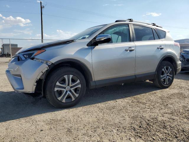 2T3ZFREV0JW408946 - 2018 TOYOTA RAV4 LE SILVER photo 1