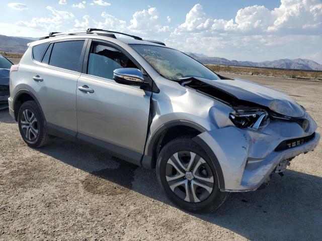 2T3ZFREV0JW408946 - 2018 TOYOTA RAV4 LE SILVER photo 4