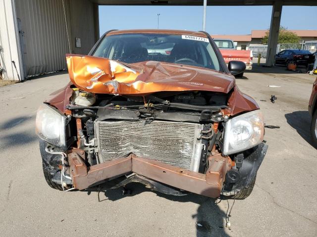 1B3CB3HA9BD262229 - 2011 DODGE CALIBER MAINSTREET ORANGE photo 5