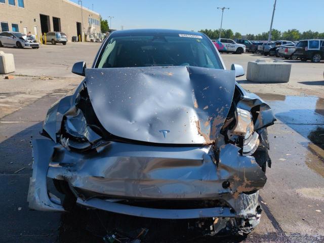 7SAYGDEEXSF292399 - 2025 TESLA MODEL Y GRAY photo 5