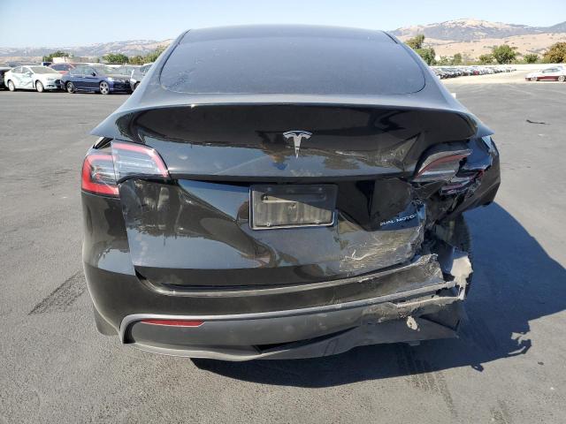 7SAYGDEE5RF986749 - 2024 TESLA MODEL Y Черный фото 6