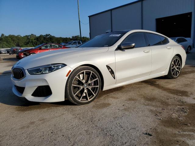 WBAGV8C02LCE26365 - 2020 BMW M850XI WHITE photo 1