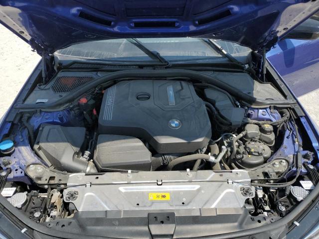 3MW5P7J05N8C57805 - 2022 BMW 330E BLUE photo 11