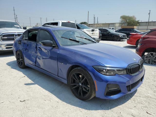 3MW5P7J05N8C57805 - 2022 BMW 330E BLUE photo 4