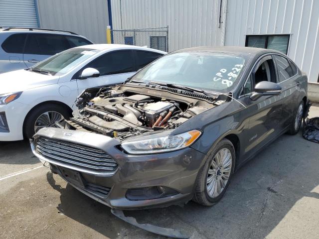 3FA6P0LU2GR173586 - 2016 FORD FUSION SE HYBRID BLACK photo 1