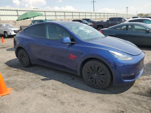 7SAYGDEE3PA152537 - 2023 TESLA MODEL Y ლურჯი ფოტო 4