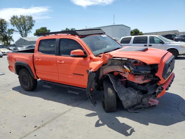 3TYCZ5AN5PT163295 - 2023 TOYOTA TACOMA DOUBLE CAB ORANGE photo 4