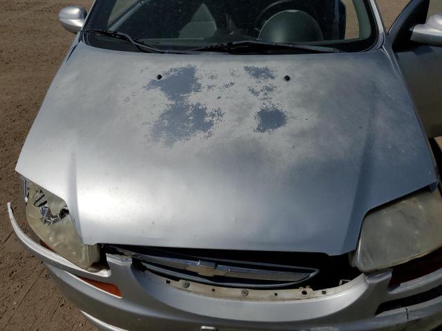 KL1TJ52644B260315 - 2004 CHEVROLET AVEO LS 银色 照片 11