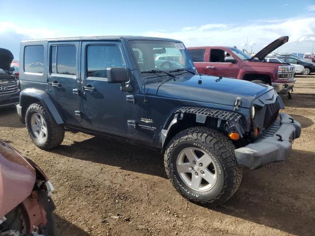 1J4GA591X7L112649 - 2007 JEEP WRANGLER SAHARA BLUE photo 4