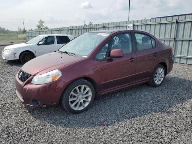 JS2YC415196200168 - 2009 SUZUKI SX4 BURGUNDY photo 1