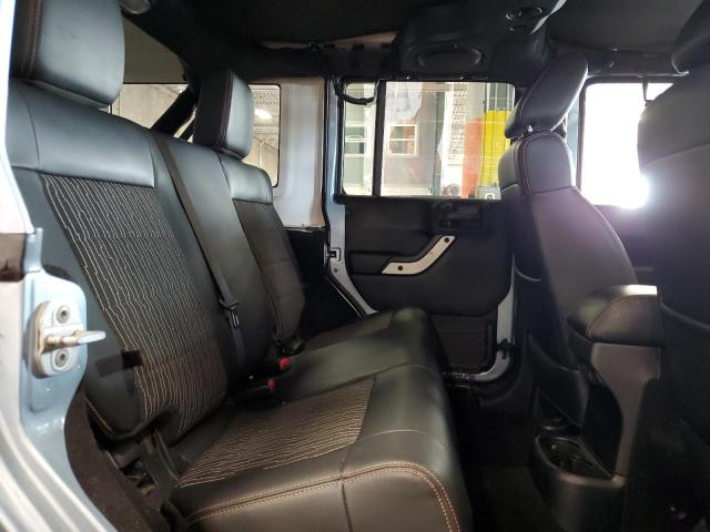 1C4BJWEG4CL162747 - 2012 JEEP WRANGLER U SAHARA ლურჯი ფოტო 10